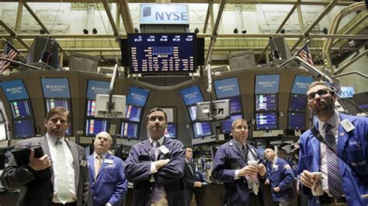 Are floor trading and human brokers are still used at most stock exchanges?