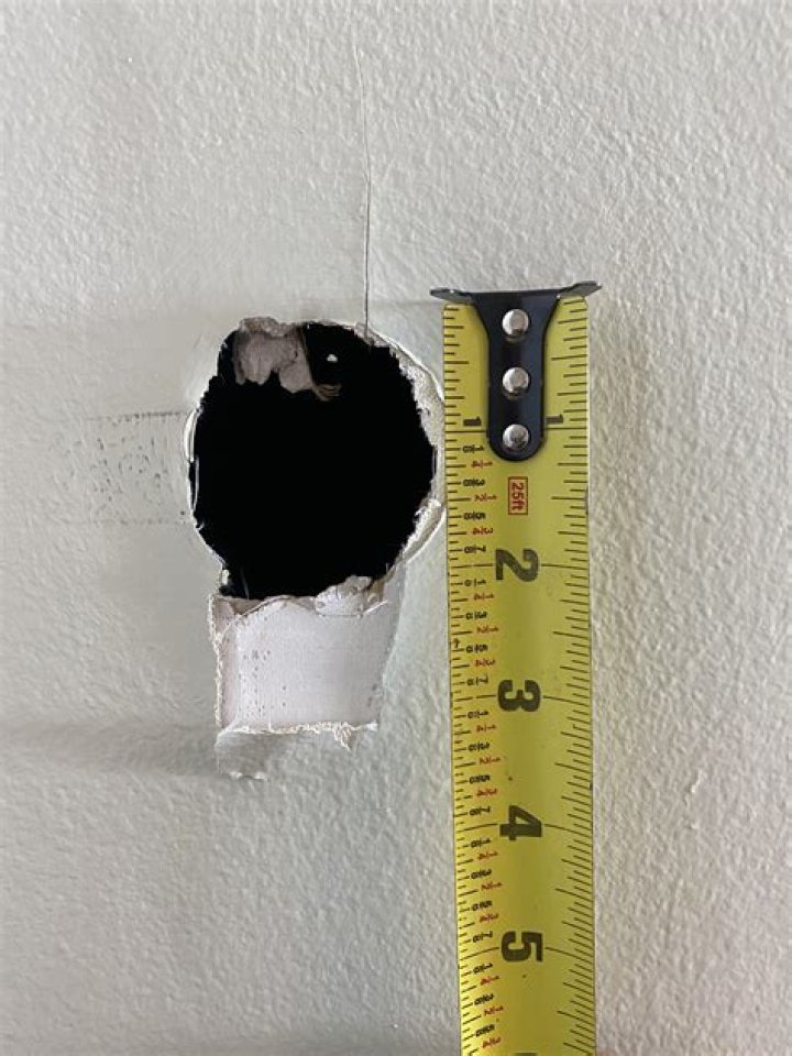 Can I drill into drywall patch?