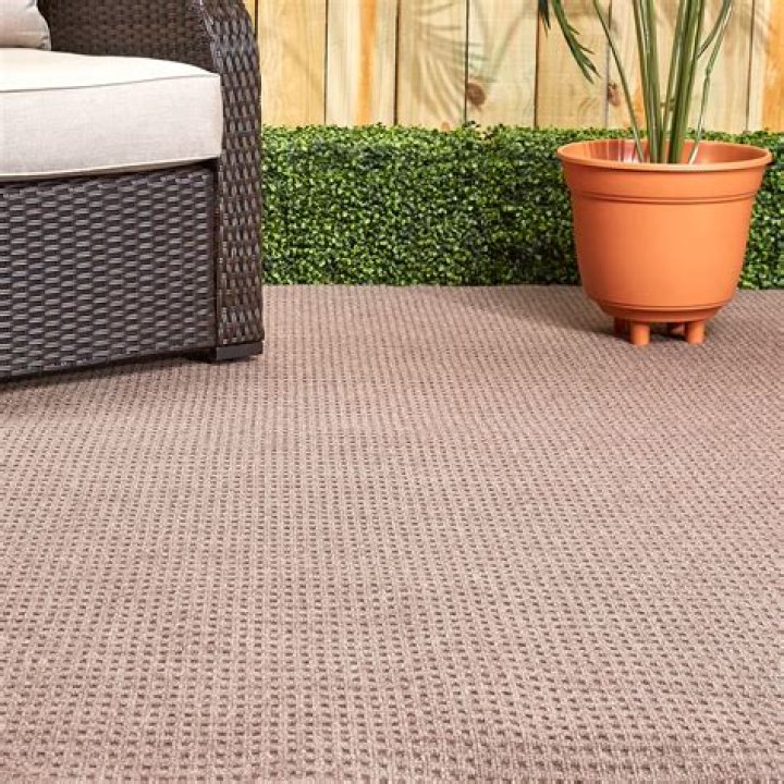 Can you put indoor outdoor carpet on dirt?
