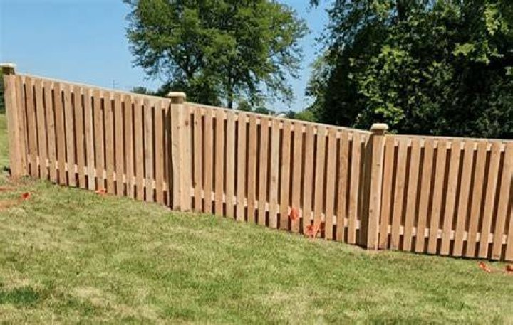 How close to a utility pole can you build a fence?