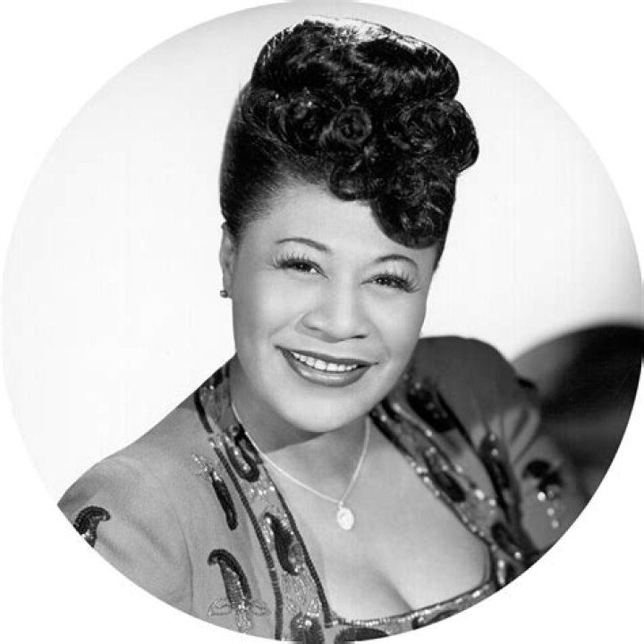How did Ella Fitzgerald break racial barriers?