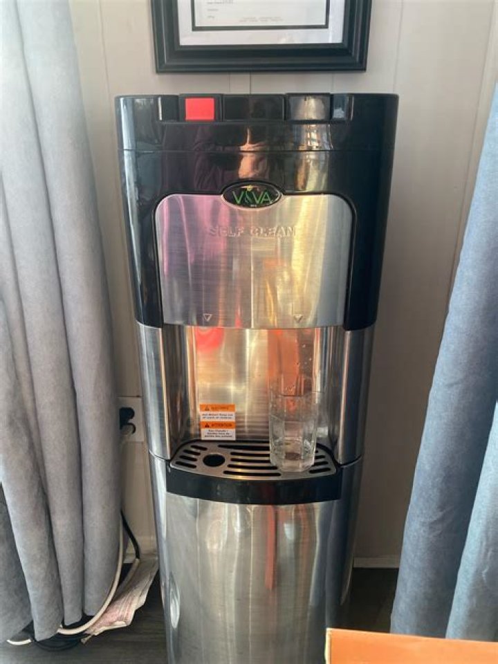 How do I clean my Viva water cooler?