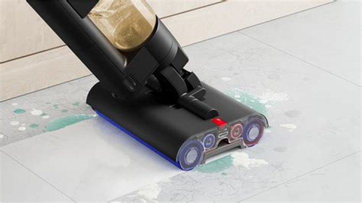 How do I raise my Dyson for thick carpet?