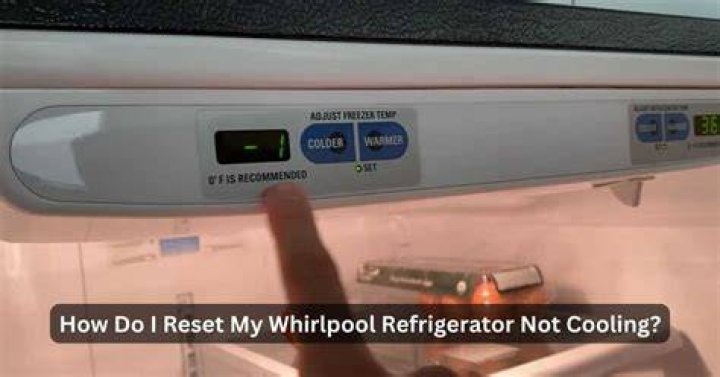 How do I reset my Whirlpool refrigerator compressor?