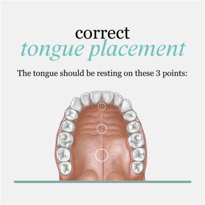 How do I stop rubbing my tongue on my teeth?