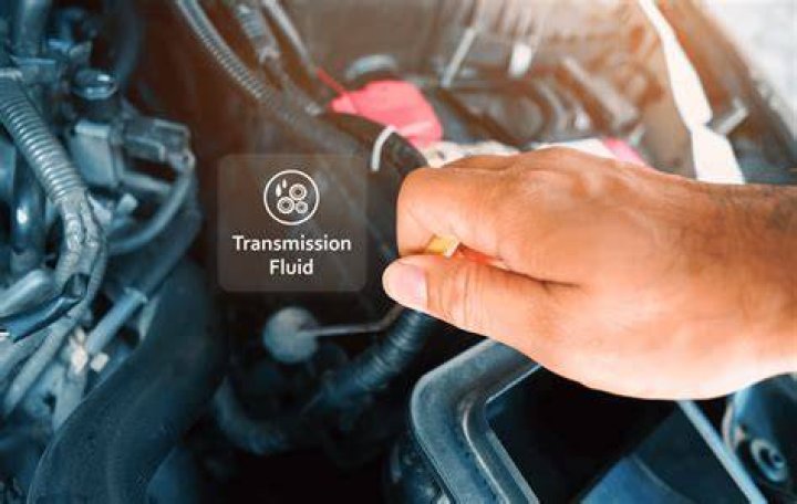 How do you check the transmission fluid on a 2000 Pontiac Grand Am?