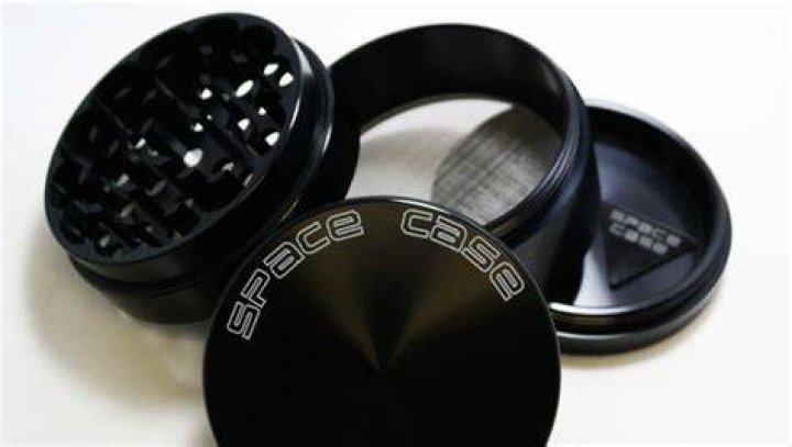 How do you clean a space case grinder?