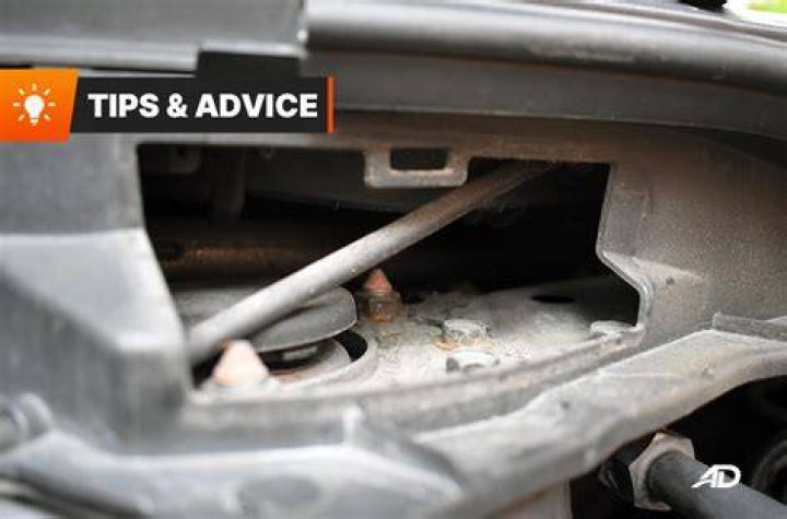 How do you clean car drain holes?