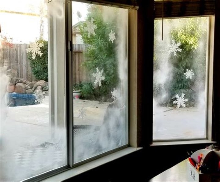 How do you get fake snow spray off Windows?