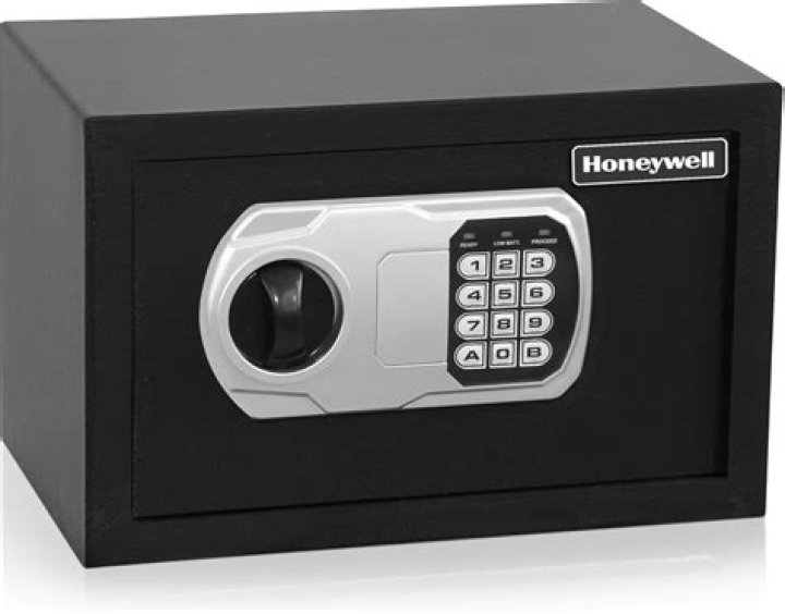 How do you open a Honeywell safe box?