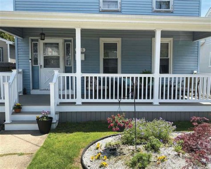 How do you paint porch railing spindles?
