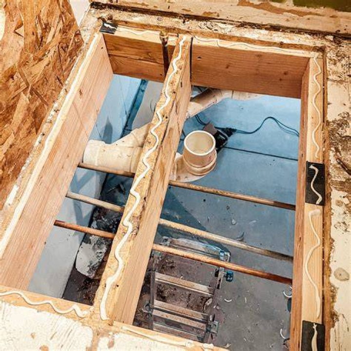 How do you remove tar paper from subfloor?