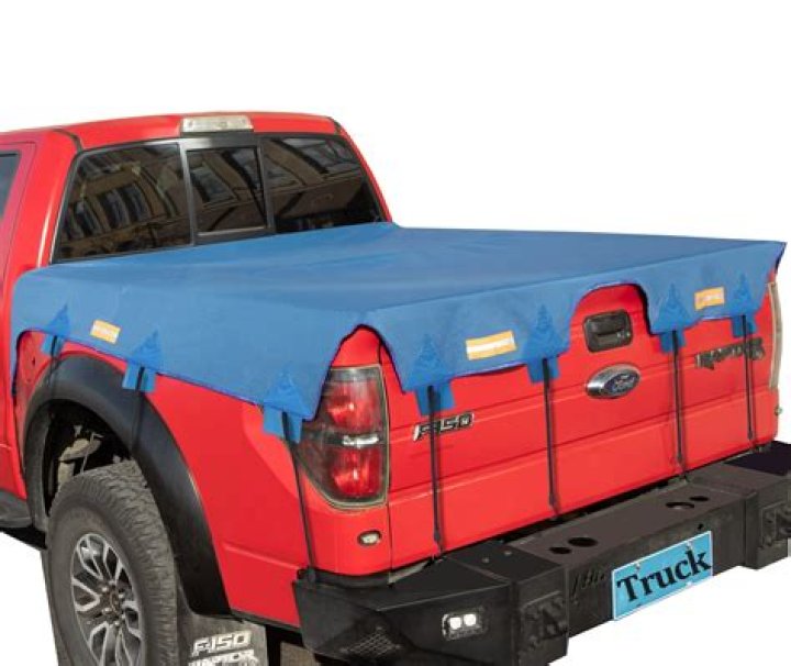 How do you secure a tarp to a truck bed?
