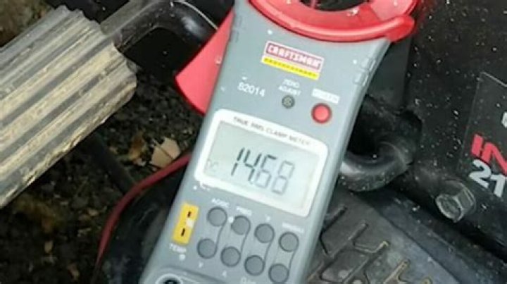 How do you test a tractor voltage regulator?