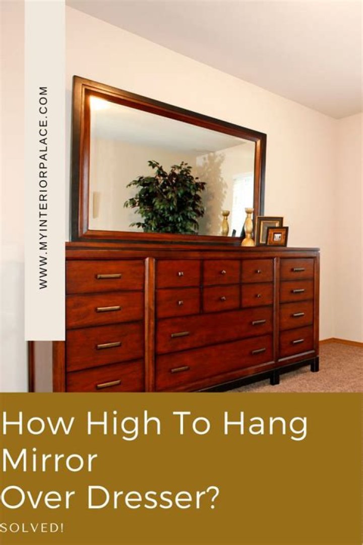 How far should a mirror be above a dresser?