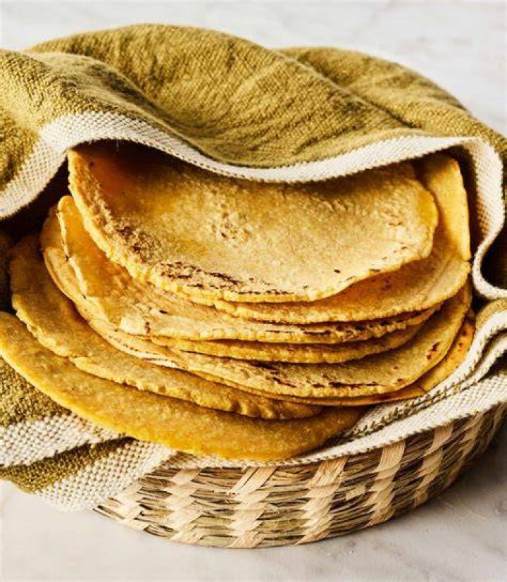 How many calories are in one homemade corn tortilla?