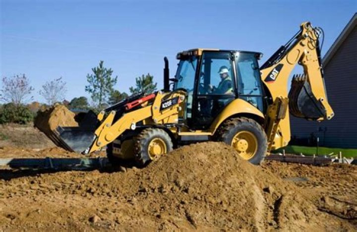 How much does a full size backhoe weight?