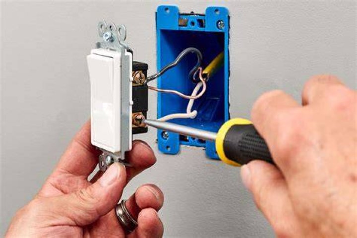 How much does an electrician charge to install a light switch?