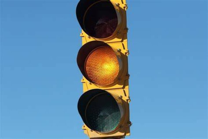 How much is a ticket for running a yellow light in Oklahoma?