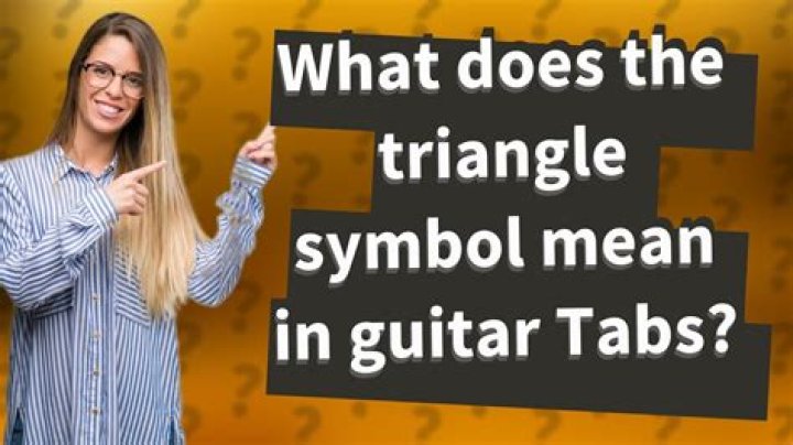 What does a triangle mean in proofreading?