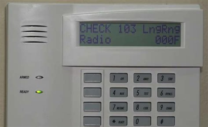 What does check long range radio mean on ADT alarm?