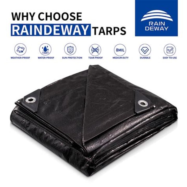 What is the black tarp in a flower bed?