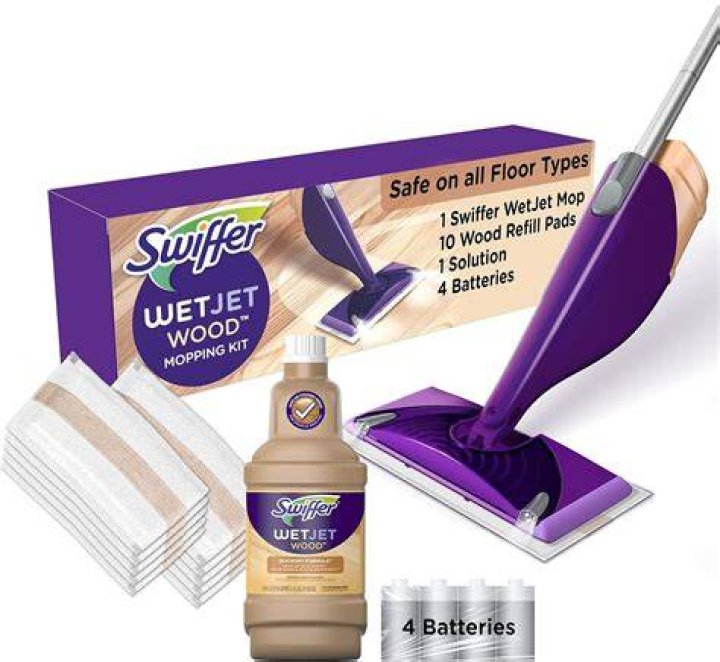 Where do the batteries go on a Swiffer WetJet wood?