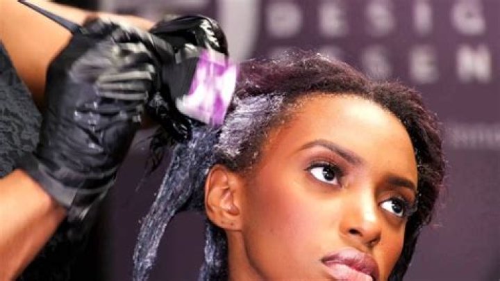 Who invented relaxers for black hair?
