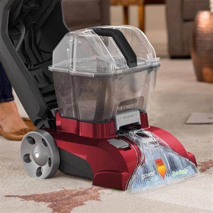Why is my Hoover carpet cleaner not spraying water?