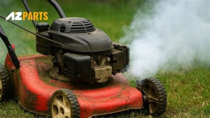 Why is my lawn mower spitting out gas?