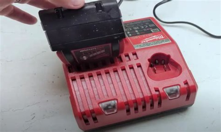 Why is my Ryobi charger flashing red?